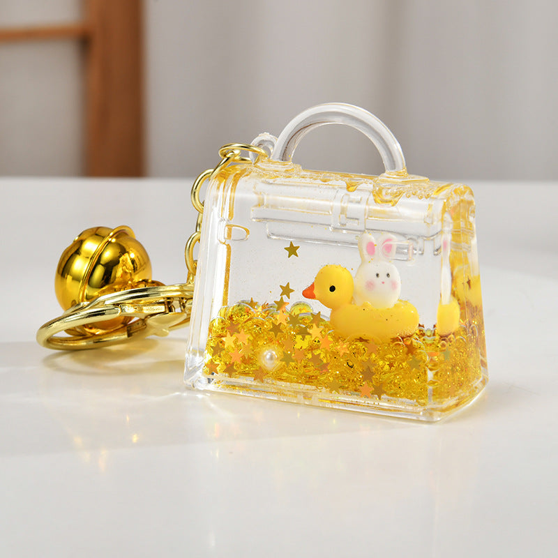 Wholesale Acrylic rabbit oil flow sand bottle keychain