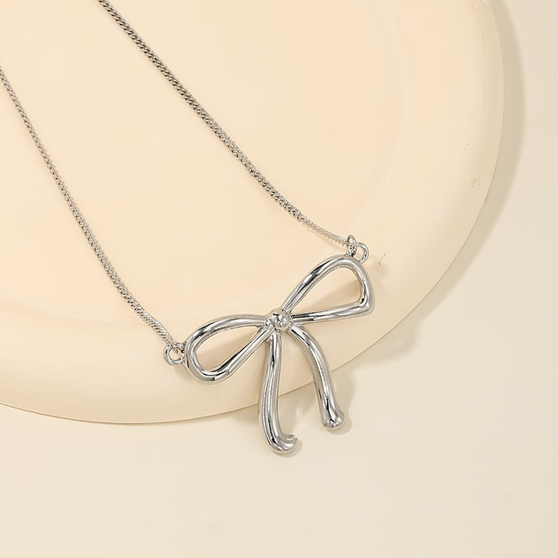 Wholesale sweet metal diamond bow necklace