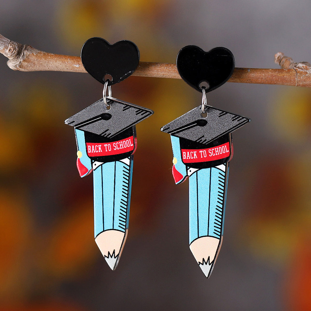 Acrylic pendant earrings for the graduation season of the school season