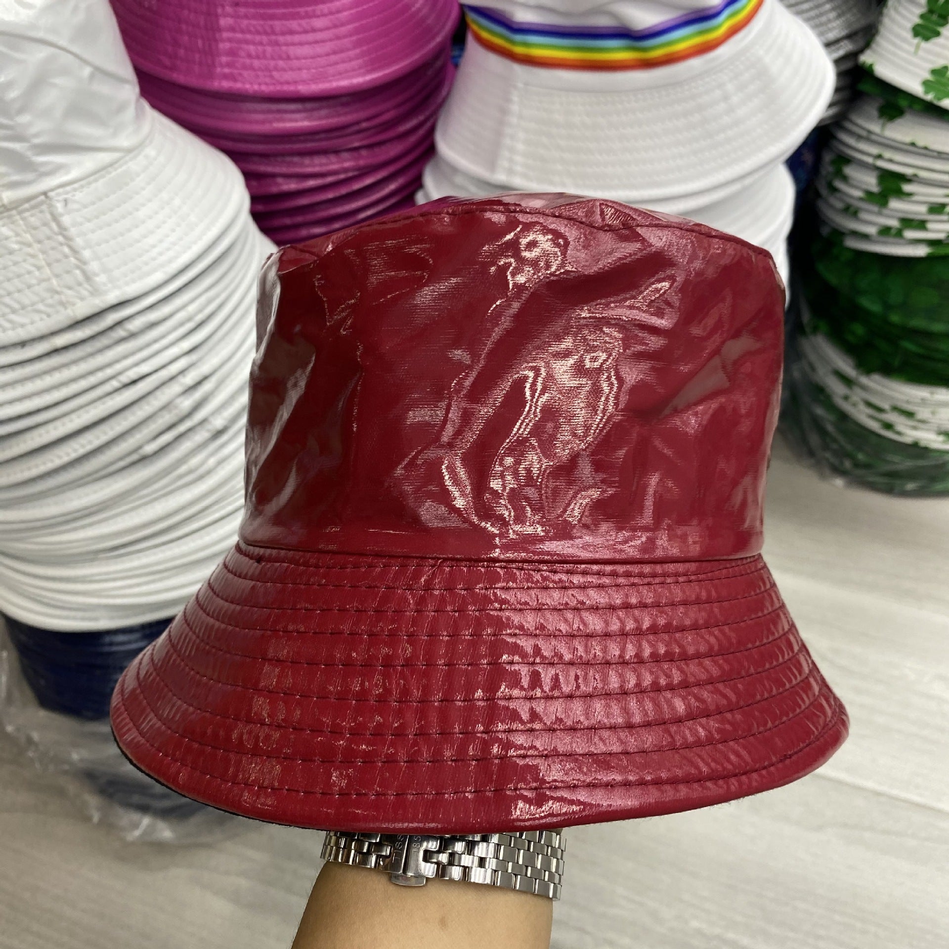Wholesale of Solid Color Patent Leather with Polyester Fisherman Hats on Both Sides
