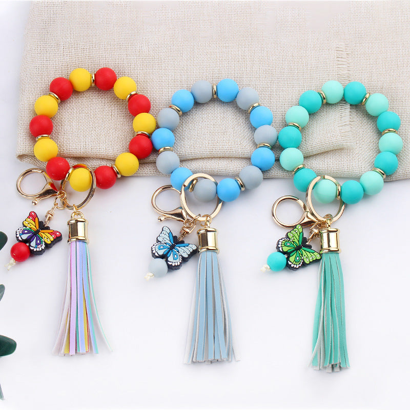 Wholesale PU Tassel Beaded Cartoon Butterfly Pendant Rainbow Leather Keychain
