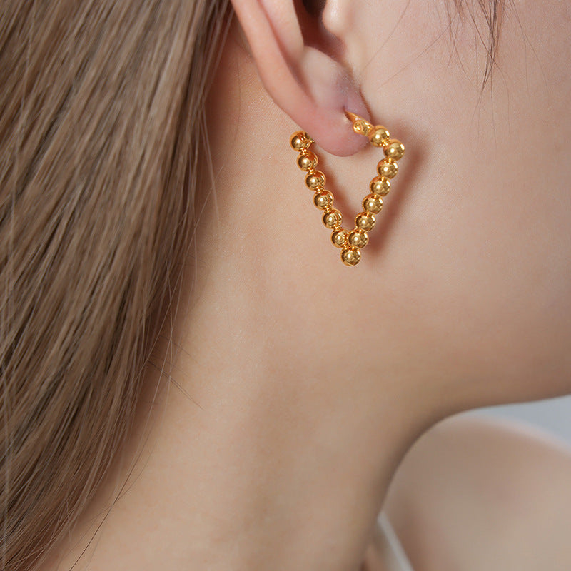 Wholesale Titanium Steel 18k Gold Vintage Steel Ball U-shaped Non-fading Earrings