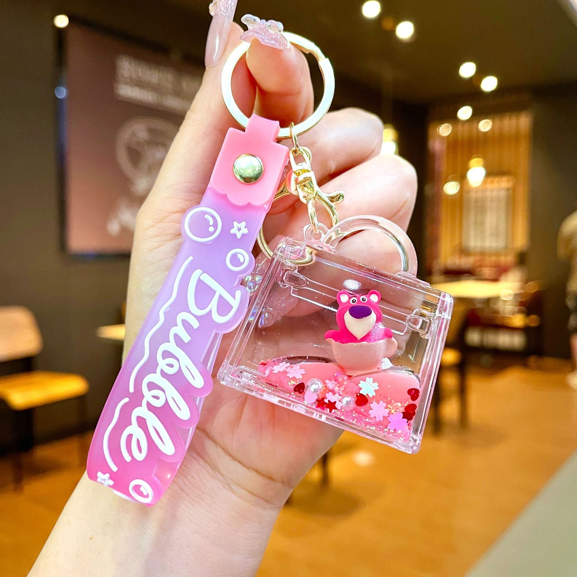 Wholesale Oil filled pink strawberry bear quicksand Keychains