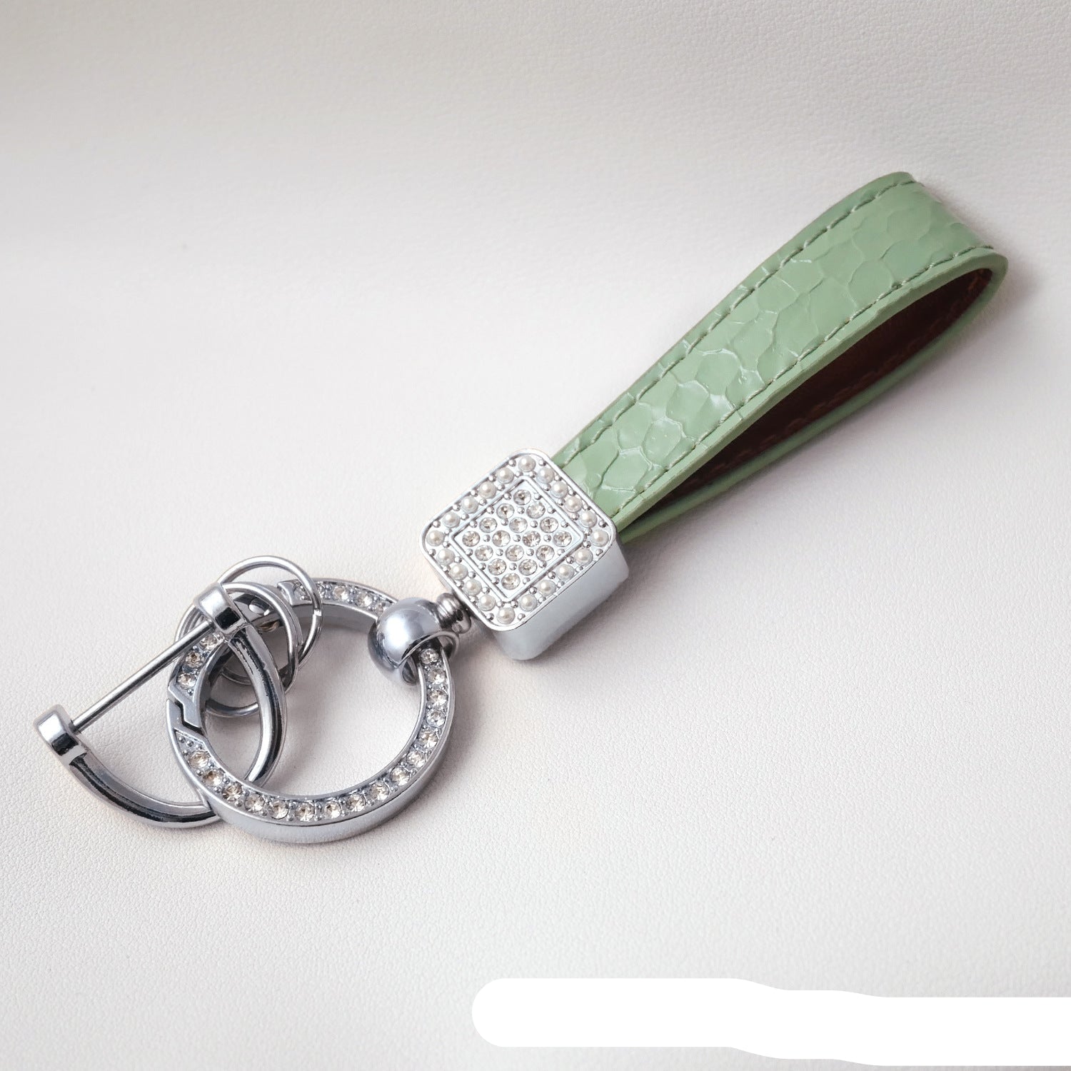 Wholesale Fashionable textured diamond spring ring keychain