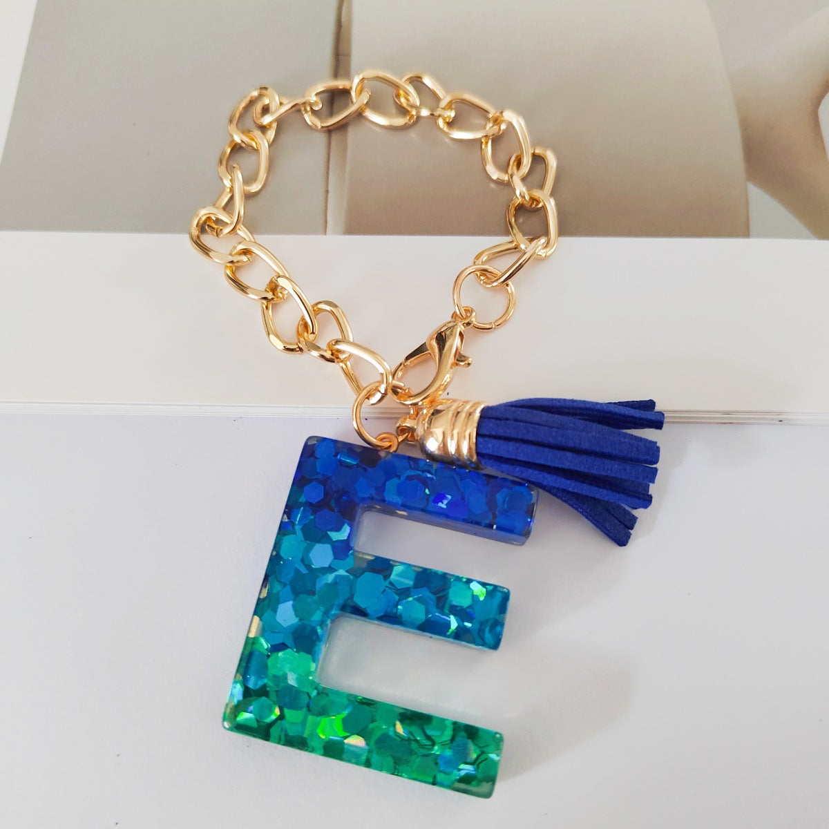 Wholesale Mixed color blue English letter keychain