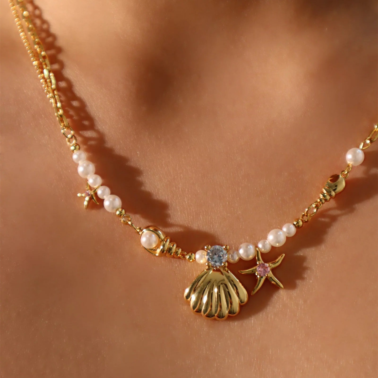 Wholesale Pearl Rice Pearl Star Mang Zircon Sea Star Shell Titanium Steel Necklace
