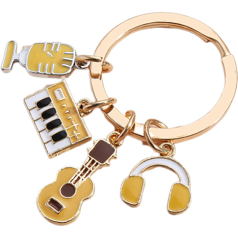 Wholesale Piano Keyboard Earphone Microphone Combination Dripping Oil Metal Keychain