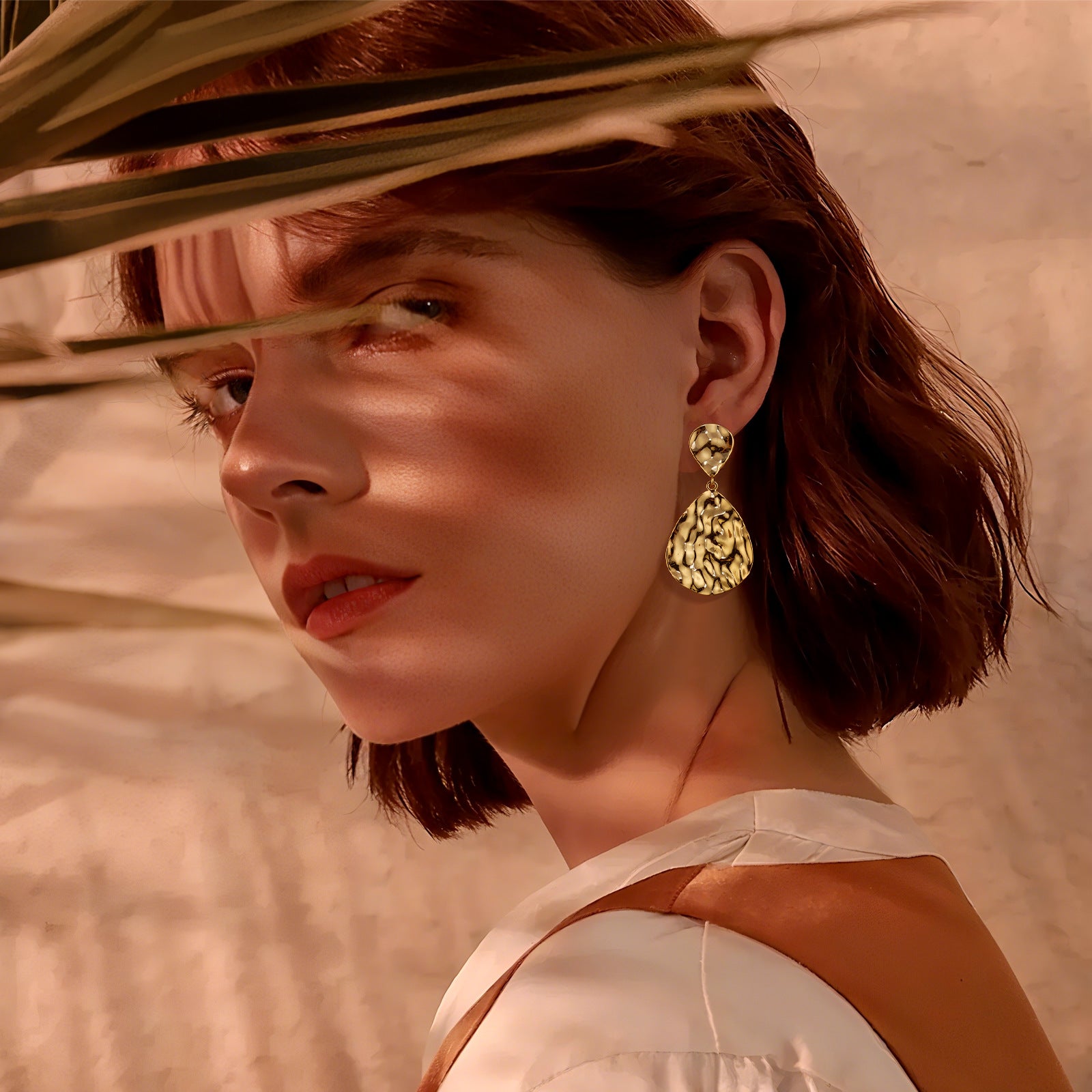 Wholesale Punch to create geometric texture earrings
