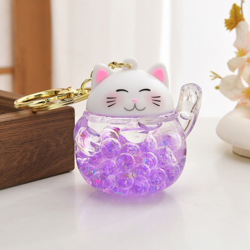 Wholesale Acrylic flowing sand bottle bag keychain