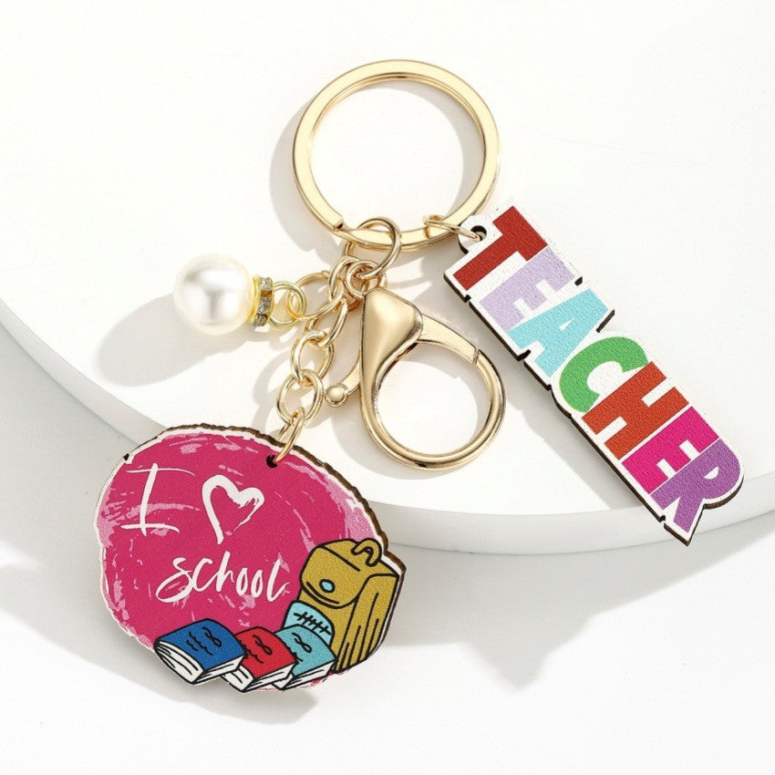 Wholesale Campus style graduation season wooden book keychain