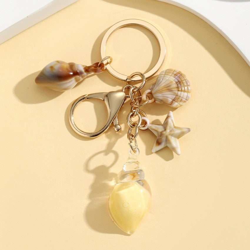 Wholesale Seaside vacation luminous conch Acrylic keychain