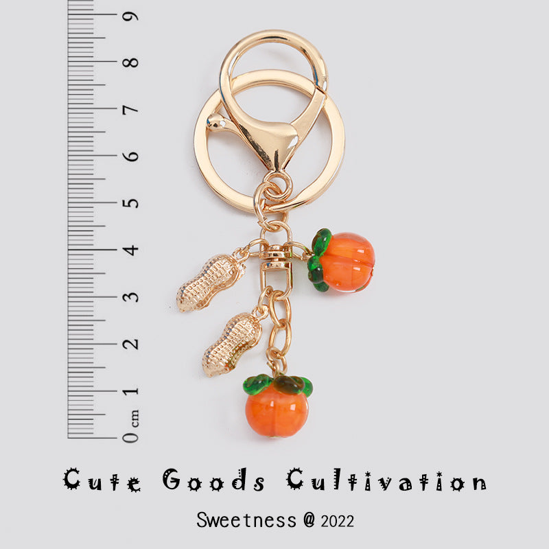 Wholesale Persimmon Keychain Good Things Happen Persimmon Ruyi Sansheng III Bag Exquisite Hanging Accessories Mobile Phone Rope Earphone Box
