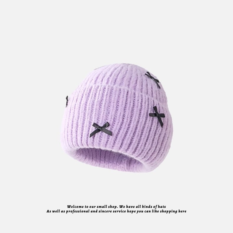 Wholesale Sweet woolen hat with bow for autumn and winter