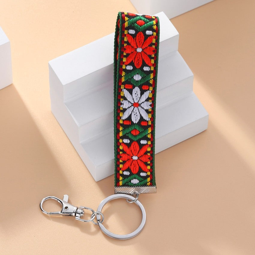 Bordado al por mayor Flower Rhombus Color Lanyard Metal Keychains
