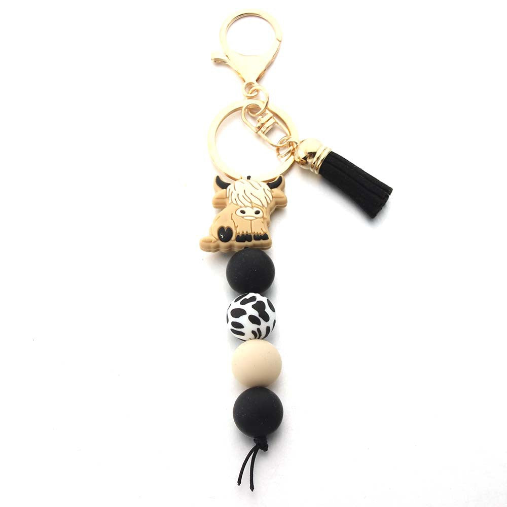Wholesale Silicone Bead Cartoon Cow Keychain Bag Charm For Couple Birthday Gift And Everyday Use