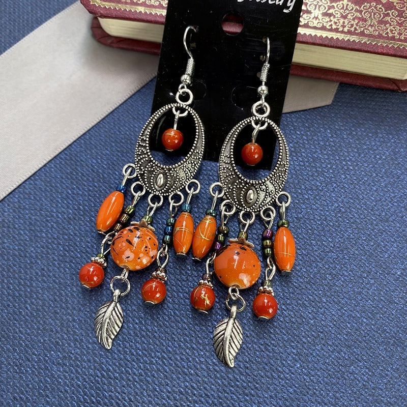 Wholesale Bohemian Retro Ethnic Style Ancient Silver Goddess Jewelry Face Skinny Tassel Long Earrings