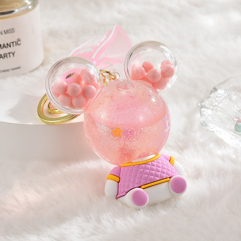 Wholesale Acrylic flowing sand bottle bag keychain