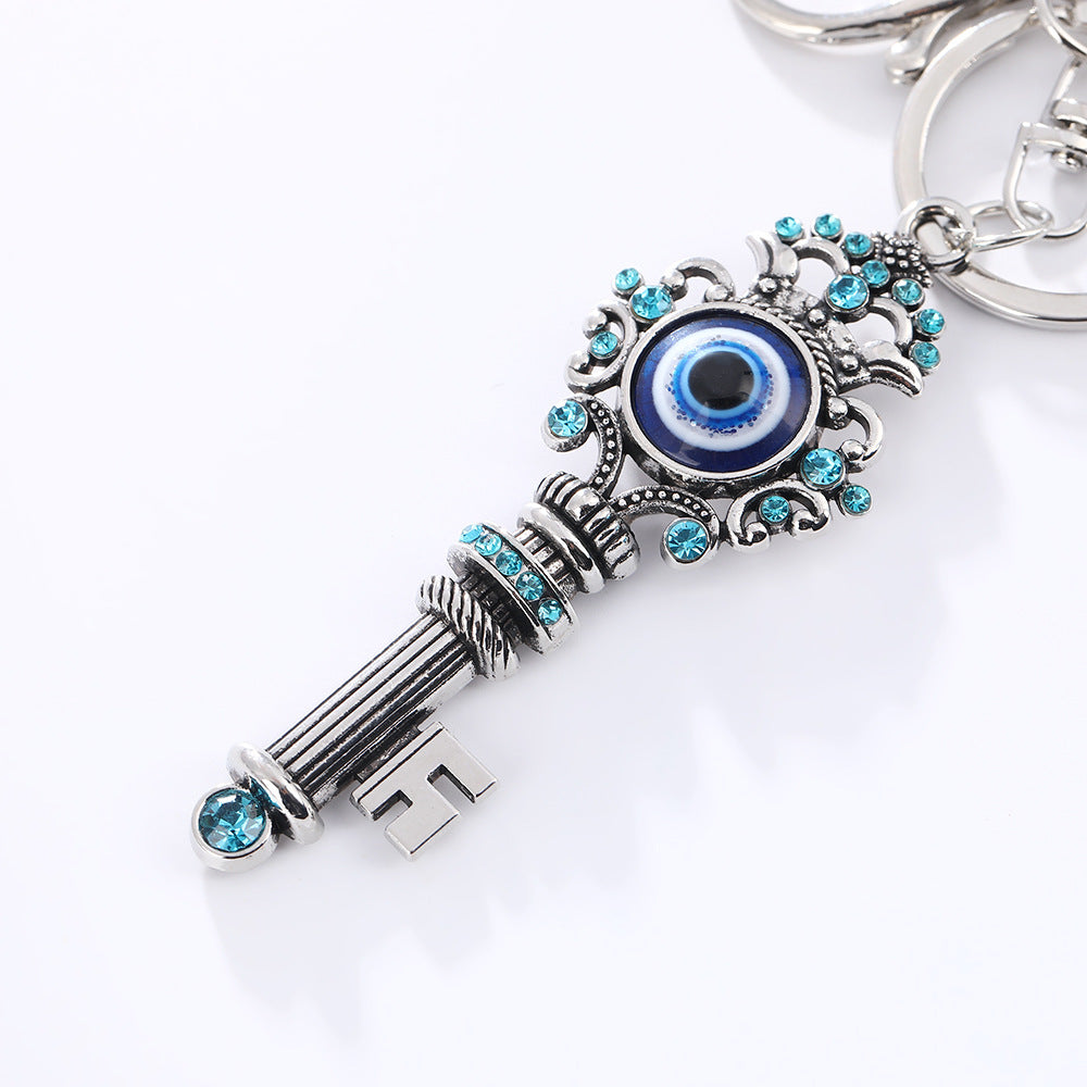 Wholesale Devil' s Eye Key Shape with Water Diamond Metal Keychain