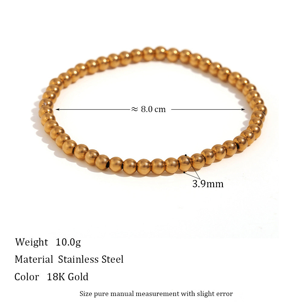 Wholesale Gold and silver colored round bead elastic stainless steel bracelets