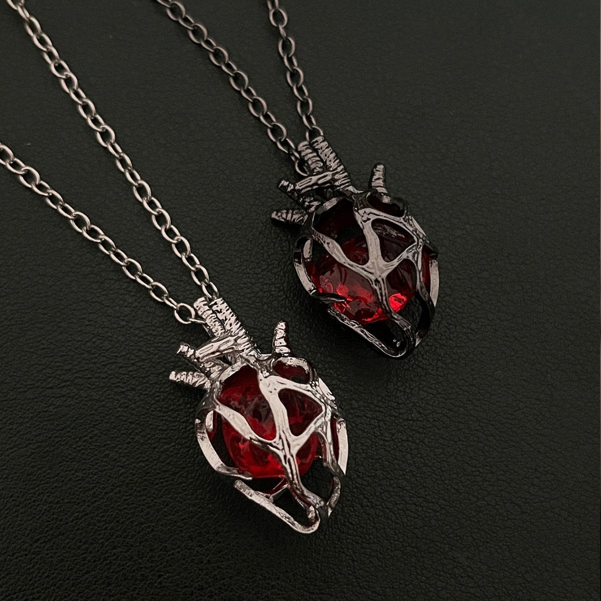 Wholesale Gothic dark style hollow heart red blue glass heart pendant necklace