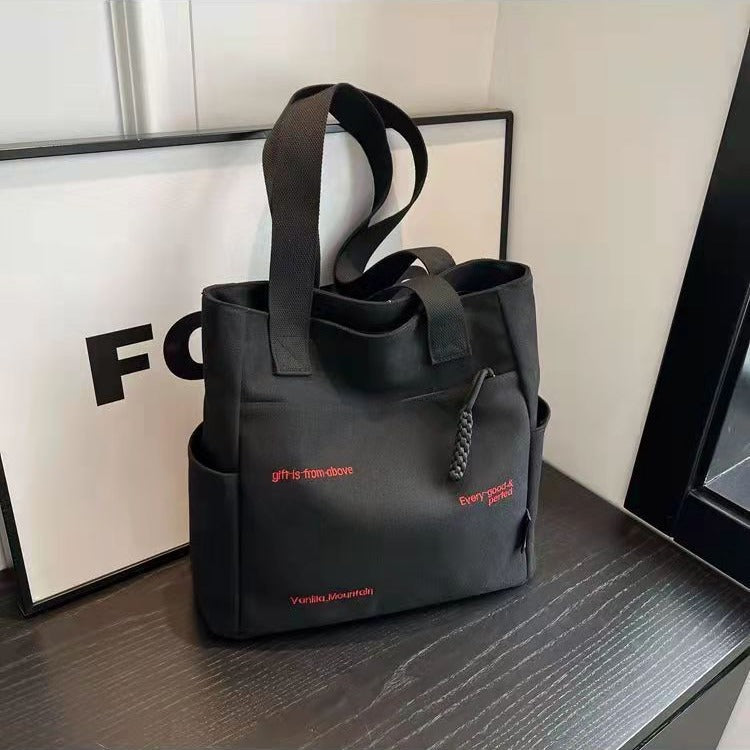 Wholesale Canvas bag shoulder bag large capacity commuter bag handbag bag