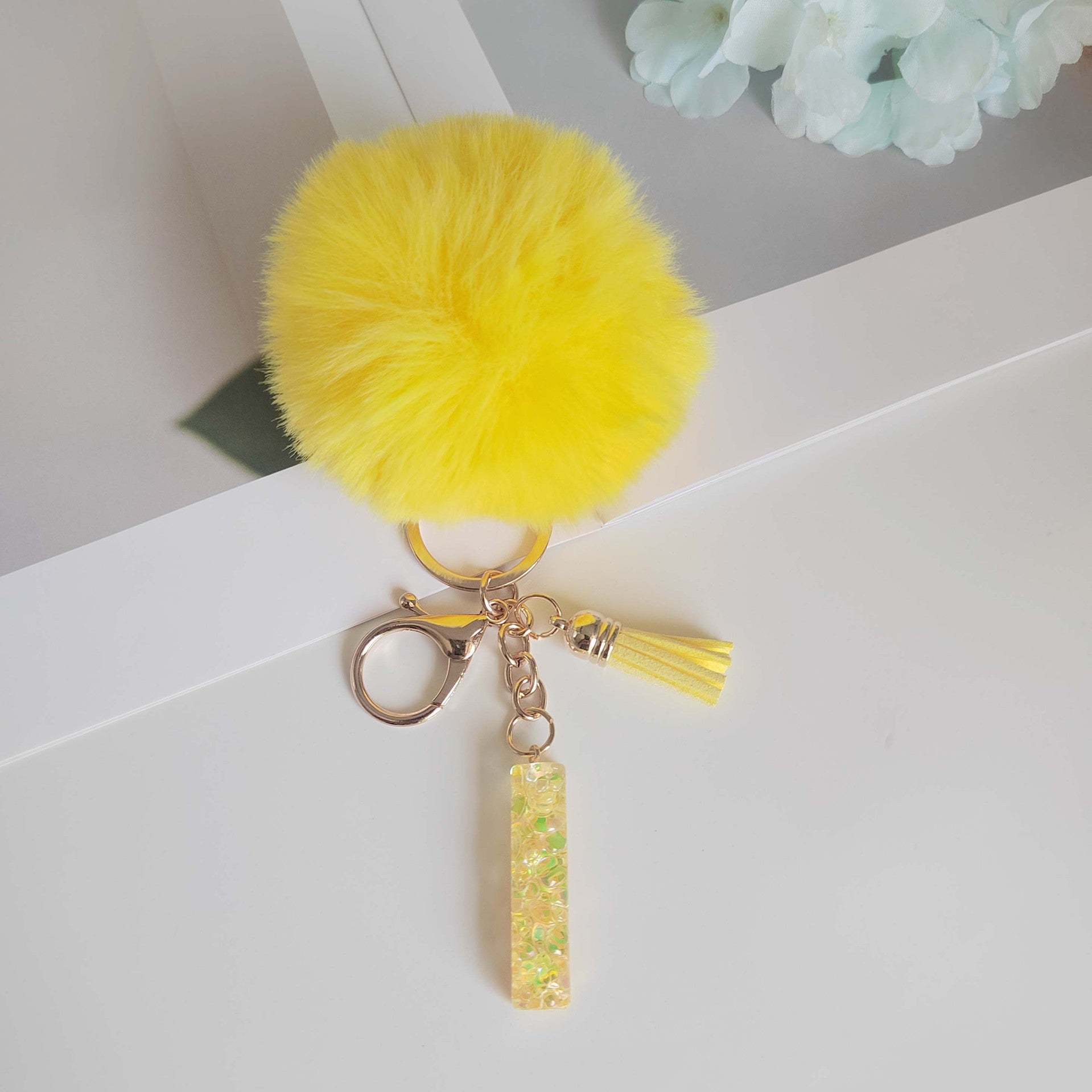Wholesale Yellow letter ball pendant flower shaped letter keychain