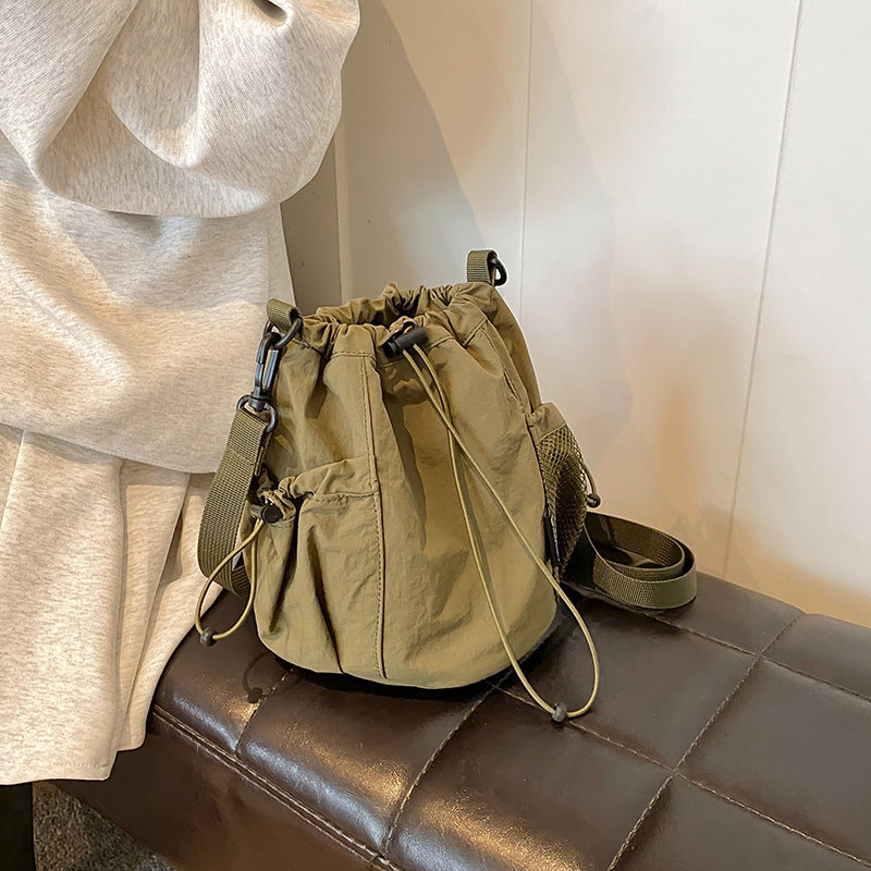Wholesale Japanese style drawstring bucket versatile nylon messenger bag