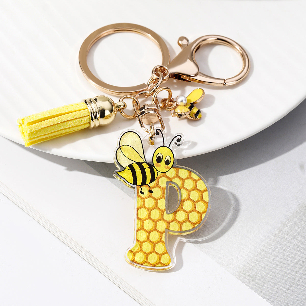 Wholesale Bee Honeycomb Acrylic English Letter Tassel Bee Enamel Keychain