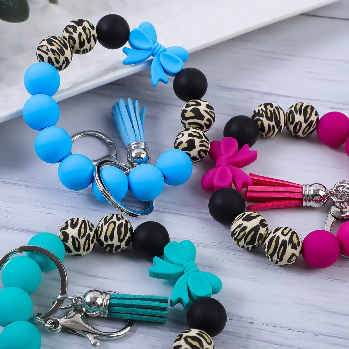Wholesale Colorful Bow Leopard Print Silicone Beaded Tassel Bracelet Keychain