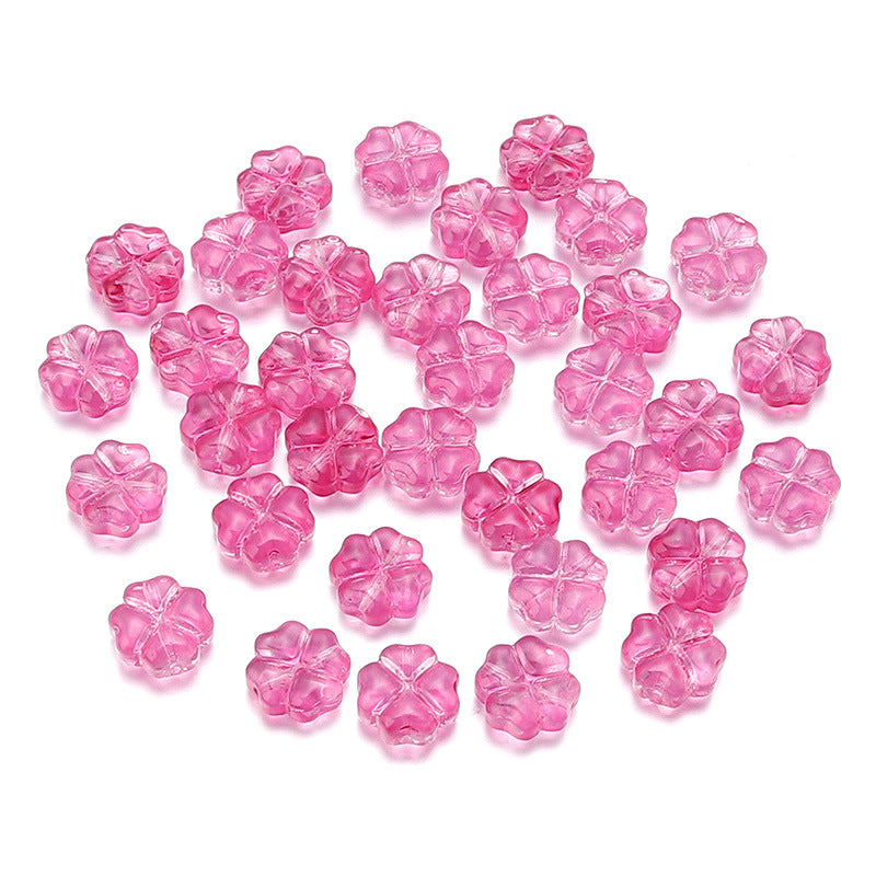 Al por mayor de 50 piezas/paquete de vidrio de color transparente de color trébol de cuatro hojas