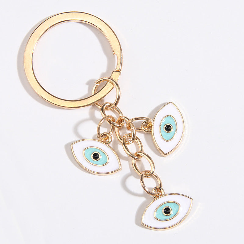 Mana al por mayor Metal Heart Devil Eye Hand of Fatima Keychain
