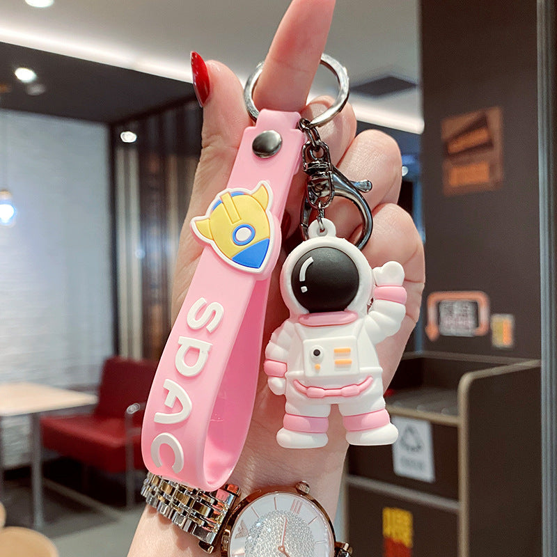 Caricatura al por mayor que ondean astronauta llaves de goma suave