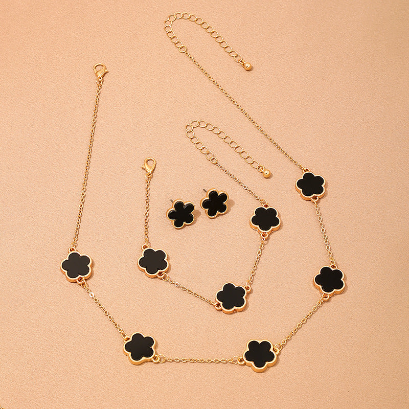 Wholesale Metal New Five Leaf Clover Flower Bracelet Necklace Earrings Ring Jewelry suit