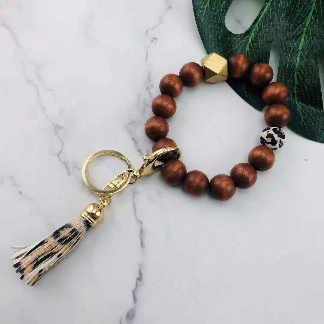 Llavero de muñeca con cuentas de silicona al por mayor