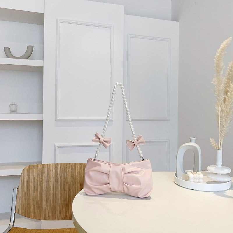 Wholesale PU Bow Fold Shoulder Bag