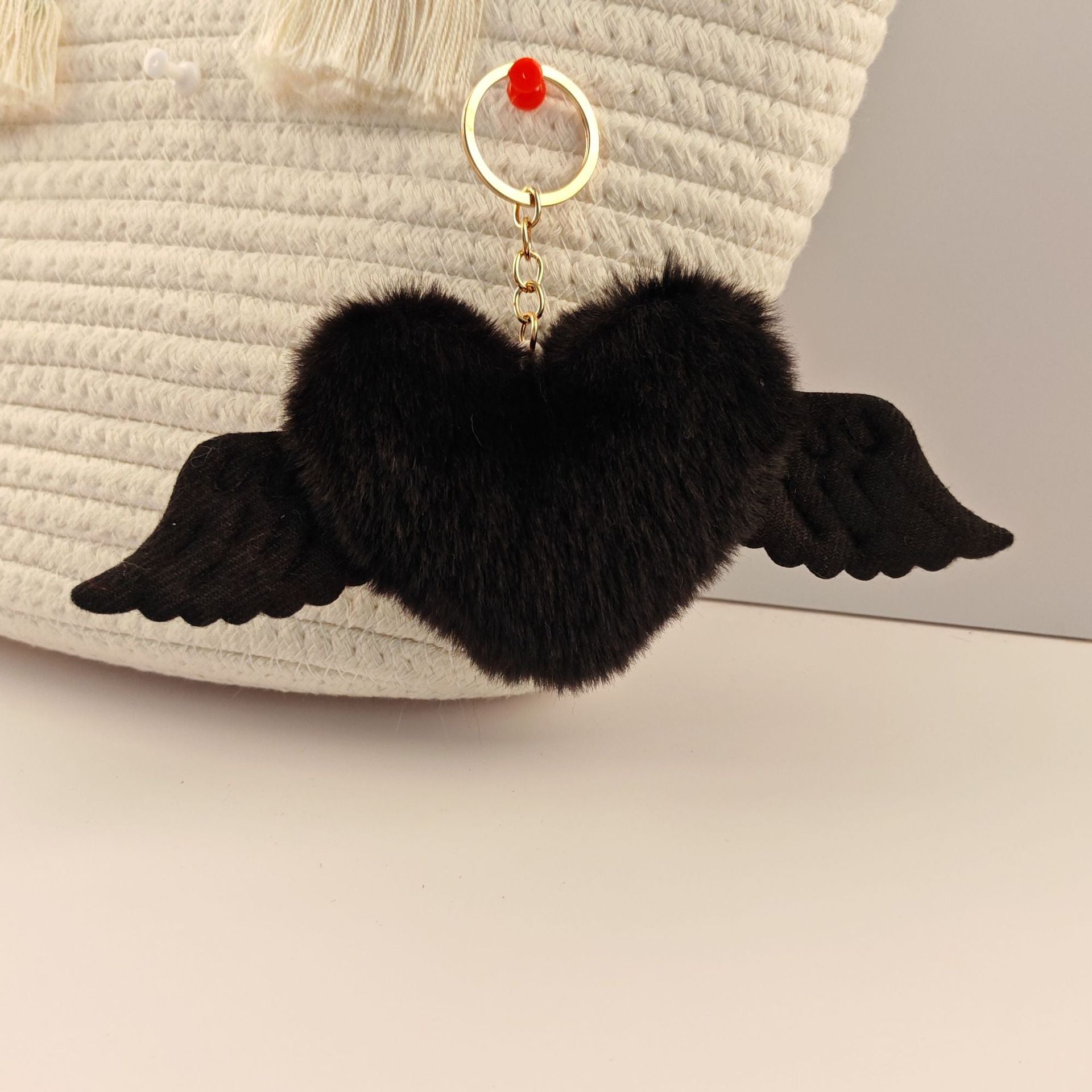 Wholesale Heart wings fur ball keychain