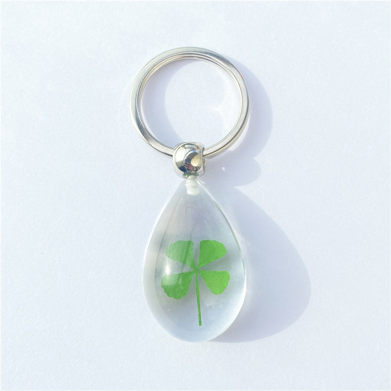 Wholesale 12pcs Four-leaf Clover Luminous Keychain