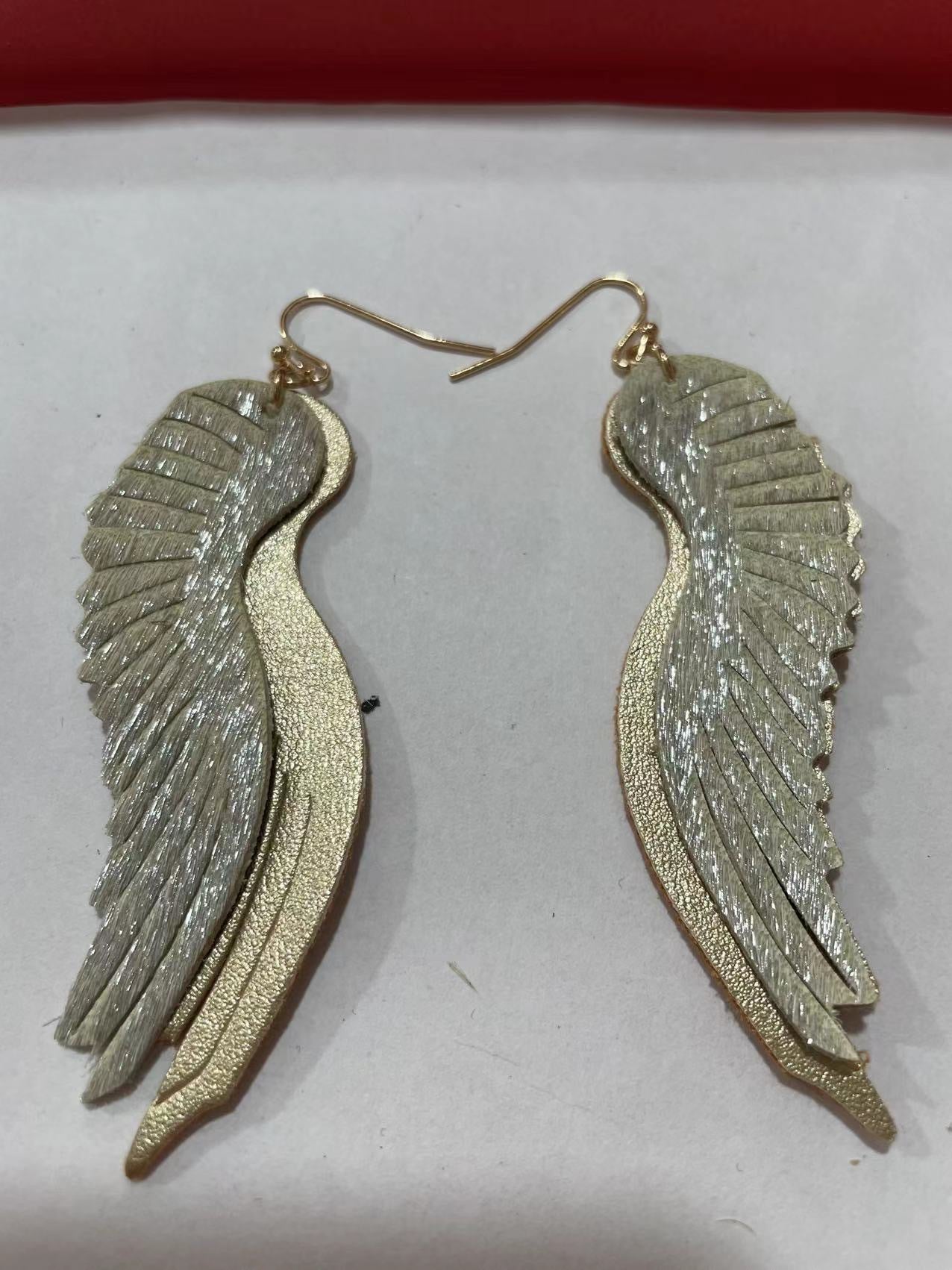 Pendientes de gorrión de plumas de cuero genuino genuinos al por mayor