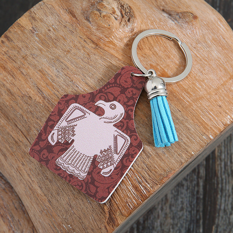 Patrón de vaca de estilo occidental al por mayor Cactus Animal Pattern Tassel Keychain