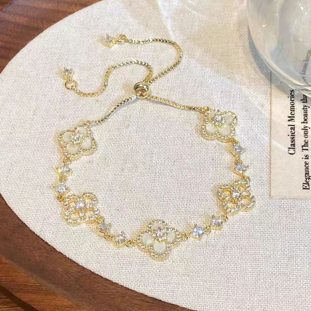 Wholesale Pink Four-leaf Clover Bracelet Micro-inlaid Zircon Hollow Luxury Jewelry