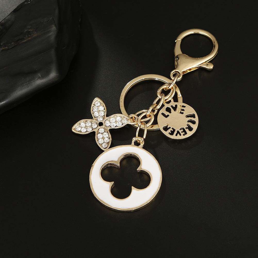 Wholesale Diamond-drip Oil Crystal Quatrefoil Zinc Alloy Keychain