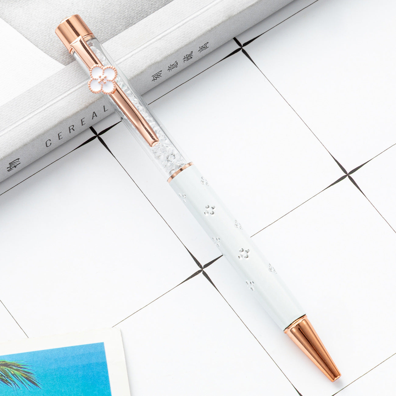 Bolígrafo de cristal de trébol de metal al por mayor