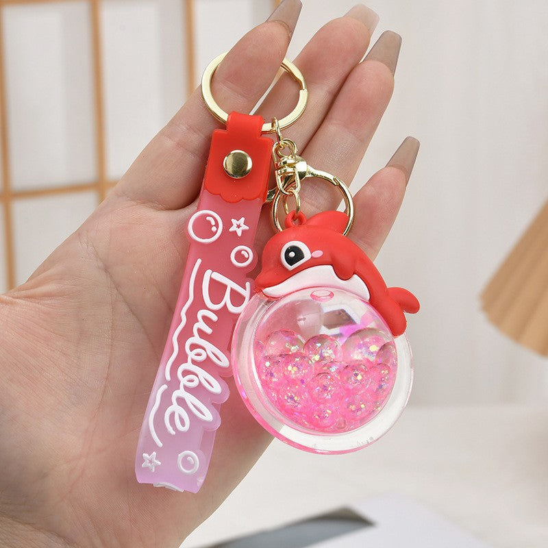 Wholesale Acrylic flowing sand bottle bag keychain