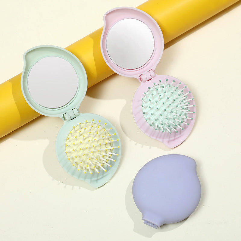 Wholesale ABS Droplet Shaped Cream Gel Folding Mirror Airbag Comb