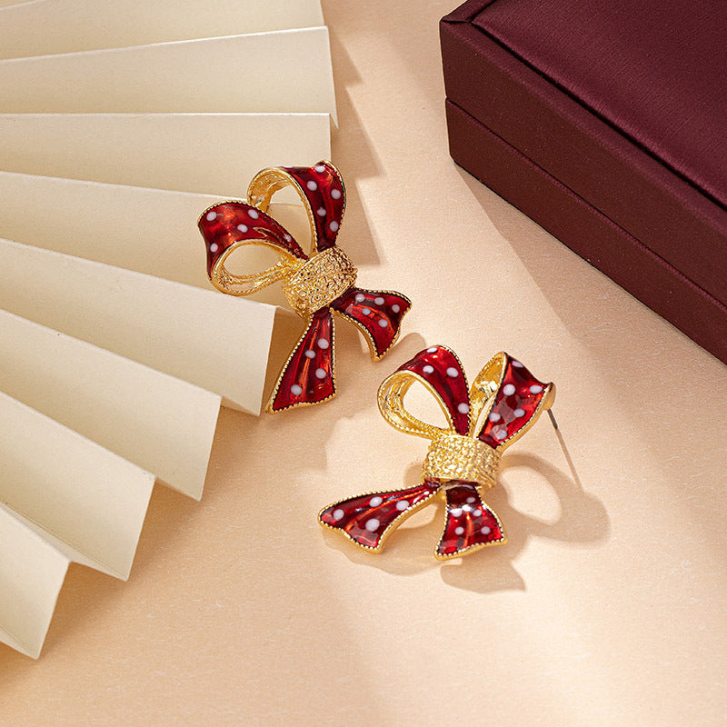 Wholesale Bow Earrings Oil Dripping Spots Zinc Alloy Earrings