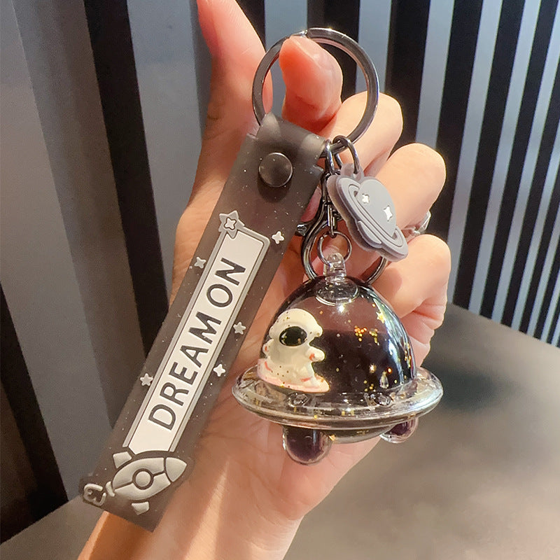 Wholesale Cartoon Black Gold Astronaut Astronaut Doll Into Oil Quicksand Drift Bottle Acrylic Keychain