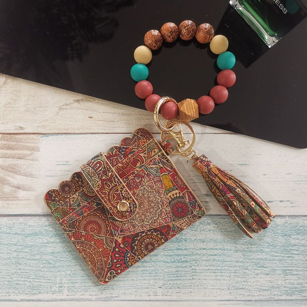 Wholesale Silicone bracelet card holder coin purse printed Keychains