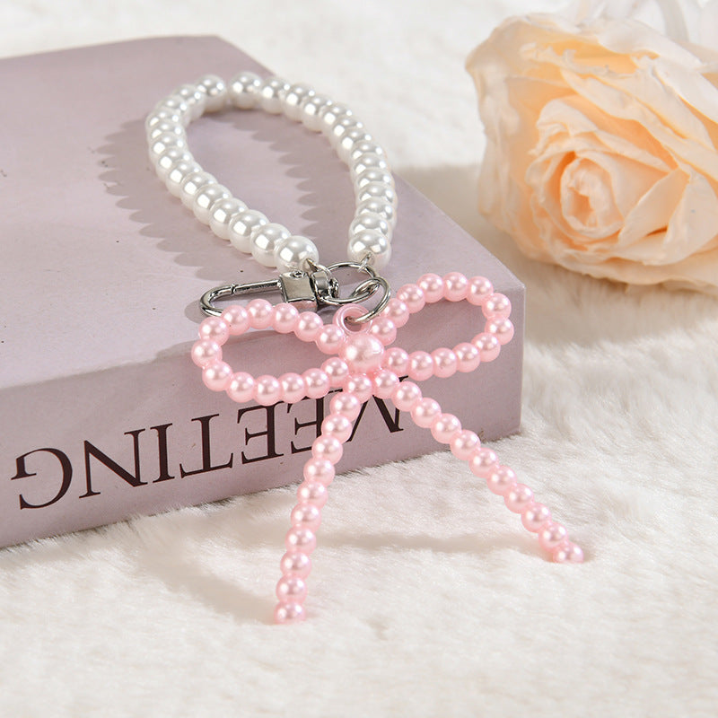 Wholesale Colorful bow cute little hat acrylic keychain