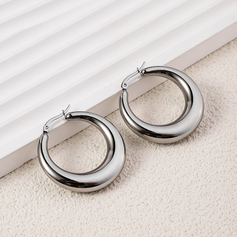 Wholesale High-end Oval Smooth Hollow Non Fading Irregular Decorated Titanium Steel Earrings