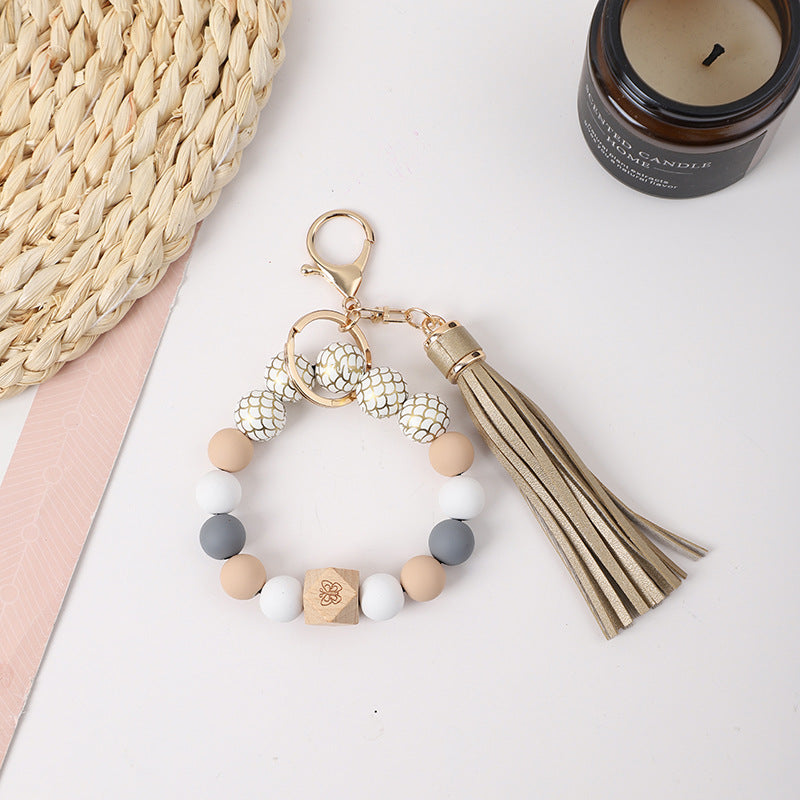 Llavero de muñeca de silicona de borla al por mayor